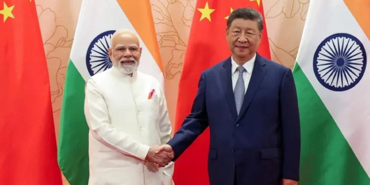 China, India pledge to be ‘partners not rivals’