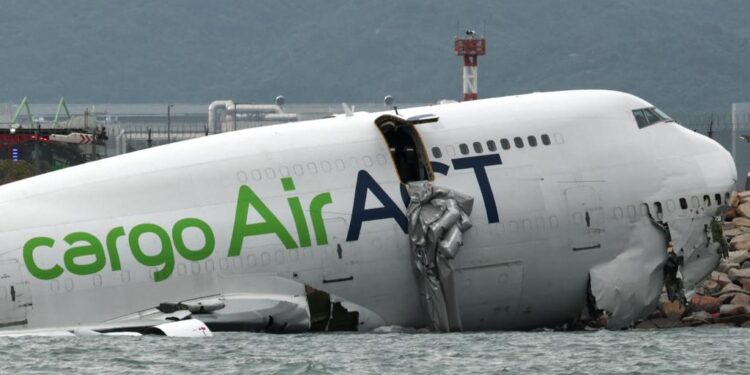 Cargo plane skids off Hong Kong airport runway into sea