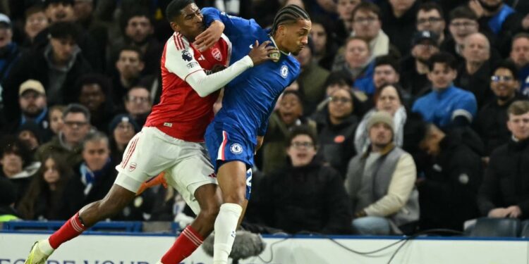 Gunners miss chance to go seven clear as 10-man Chelsea stand tall in draw