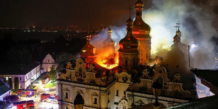Russian strikes kill 11, set historic cathedral in Kyiv ablaze