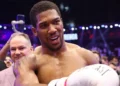 Joshua survives two knockdowns against Prenga to set up Fury fight